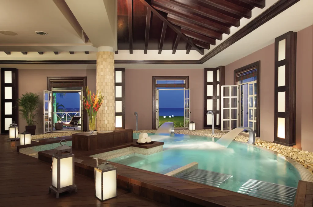 Indoor hydrotherapy spa pool with water features at Secrets St. James Montego Bay.