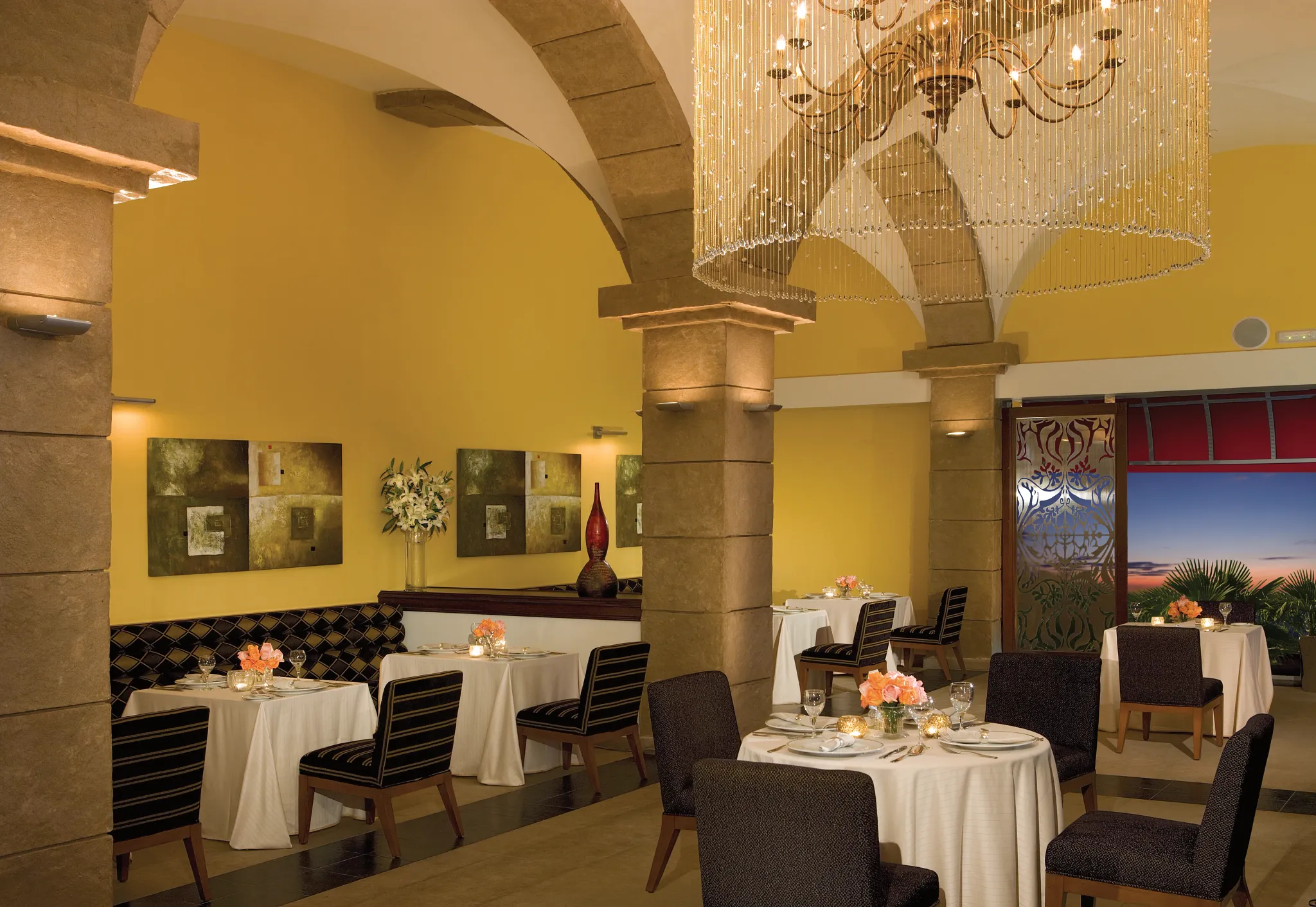 Portofino Italian restaurant at Secrets St. James Montego Bay featuring a romantic dining setting with indoor and outdoor seating and classic Italian cuisine.