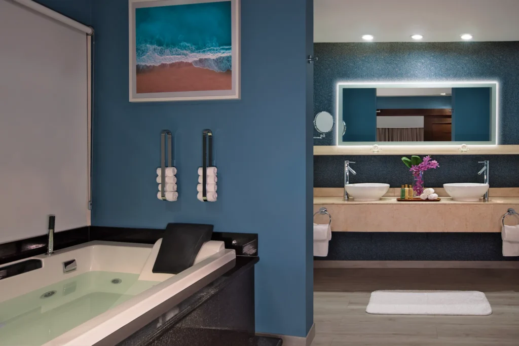 Preferred Club Master Suite Ocean Front bathroom with hot tub and double vanity at Secrets St. James Montego Bay.