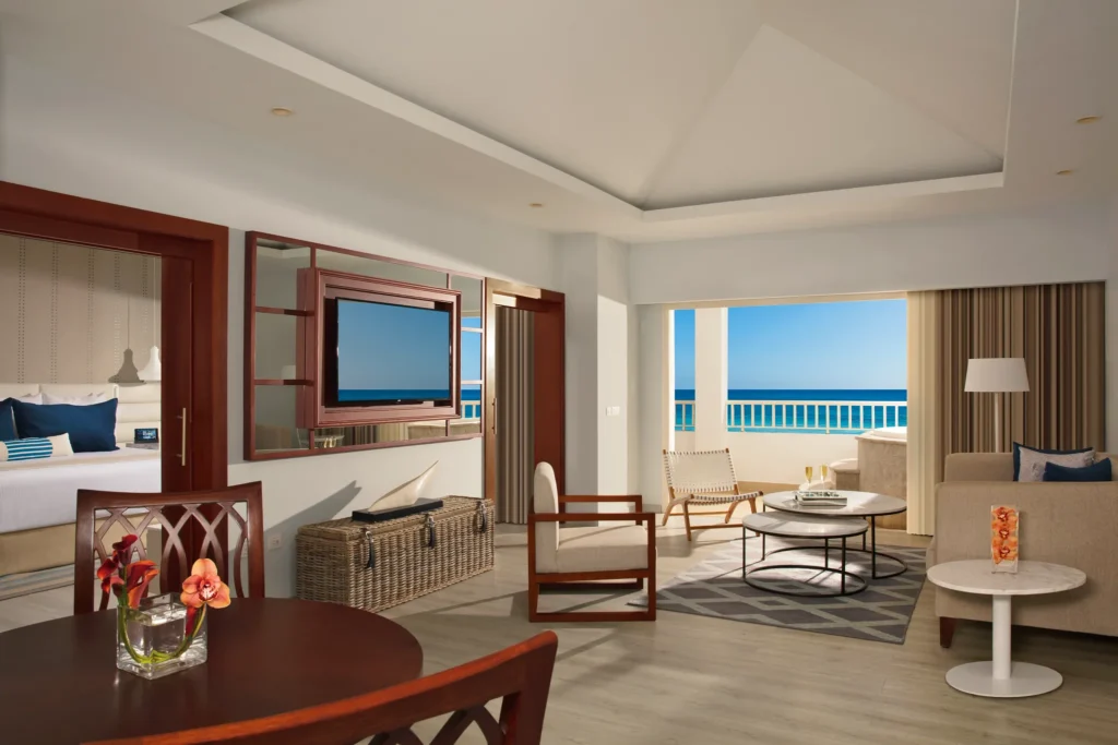 Preferred Club Master Suite Ocean Front Swim Out living room with terrace and ocean view at Secrets St. James Montego Bay.