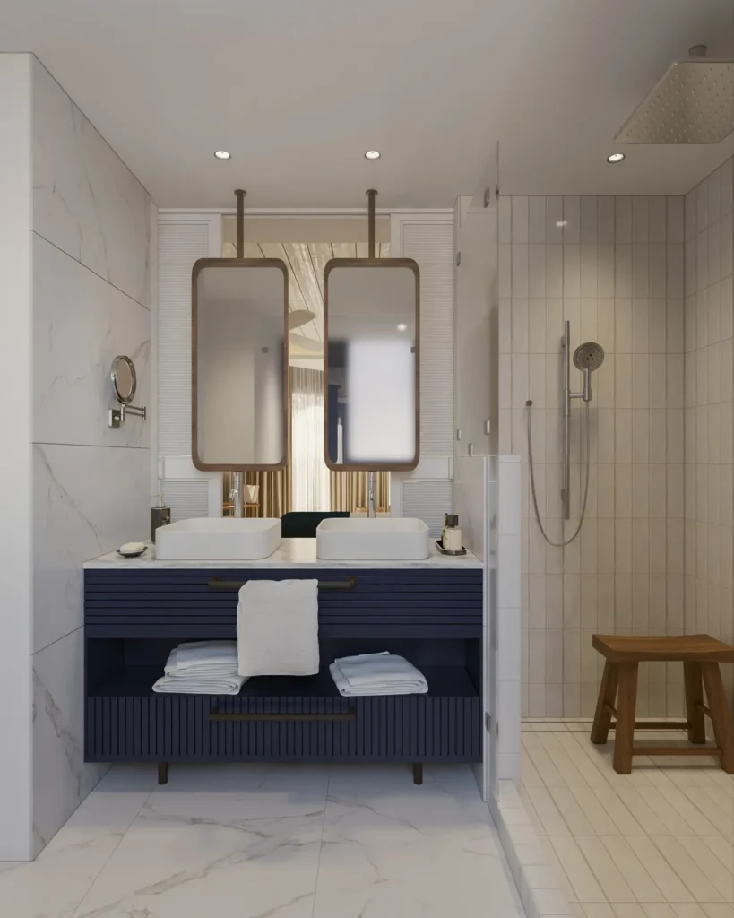 Deluxe Partial Ocean View bathroom with dual sinks and glass-enclosed rain shower at Secrets St. Lucia Resort & Spa.