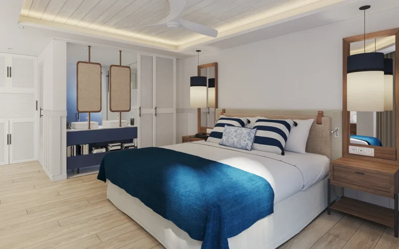 Deluxe Partial Ocean View king room with modern furnishings and open layout at Secrets St. Lucia Resort & Spa.
