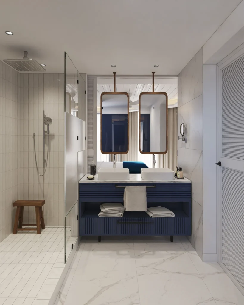 Deluxe Tropical View bathroom with double sinks, glass rain shower, and modern vanity at Secrets St. Lucia Resort & Spa.