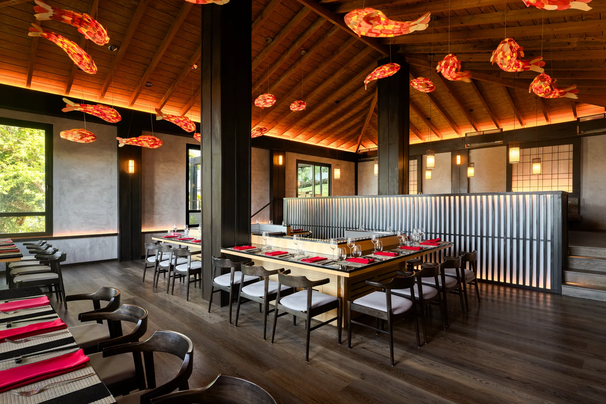 Himitsu restaurant at Secrets St. Lucia Resort & Spa featuring a stylish dining space with teppanyaki tables and Pan-Asian cuisine.