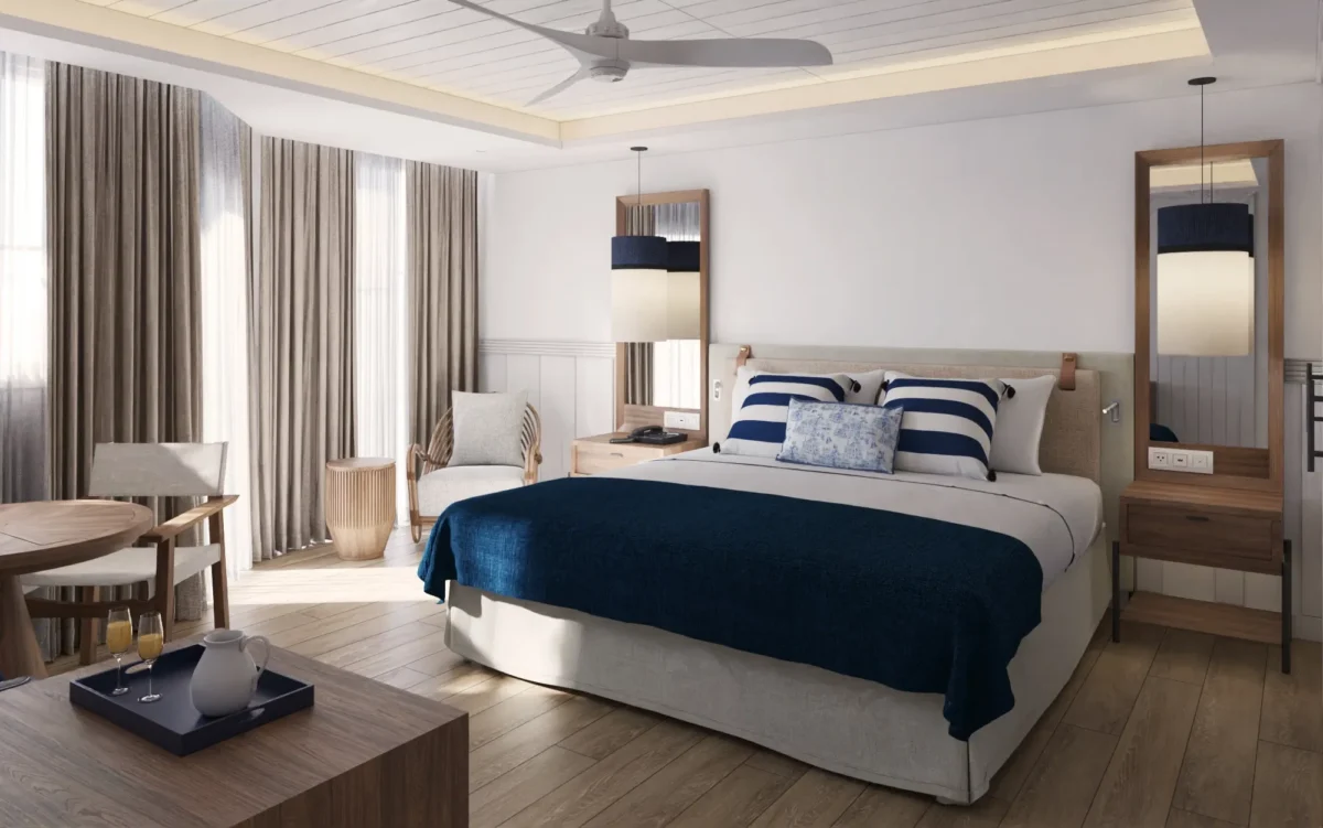 Preferred Club Master Ocean View suite bedroom with king bed and modern Caribbean décor at Secrets St. Lucia Resort & Spa.