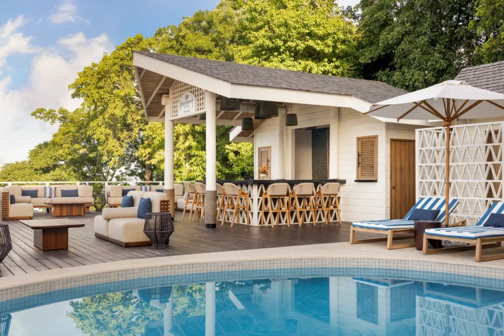 Preferred Club Pool Bar at Secrets St. Lucia Resort & Spa featuring an exclusive swim-up bar in a private pool area with tropical cocktails.