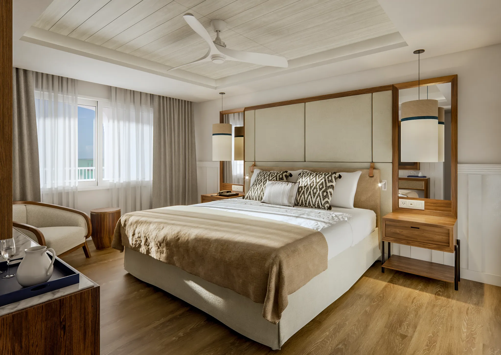 Preferred Club Presidential Suite bedroom with king bed and ocean view balcony access.