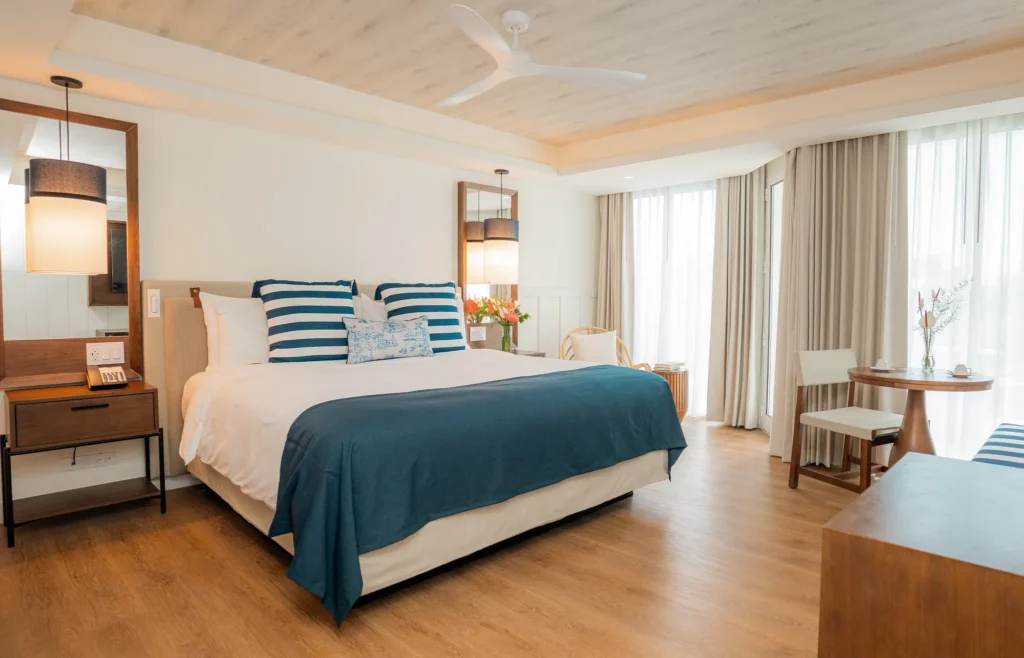 Preferred Club Superior Swim Out room with king bed and balcony access at Secrets St. Lucia Resort & Spa.