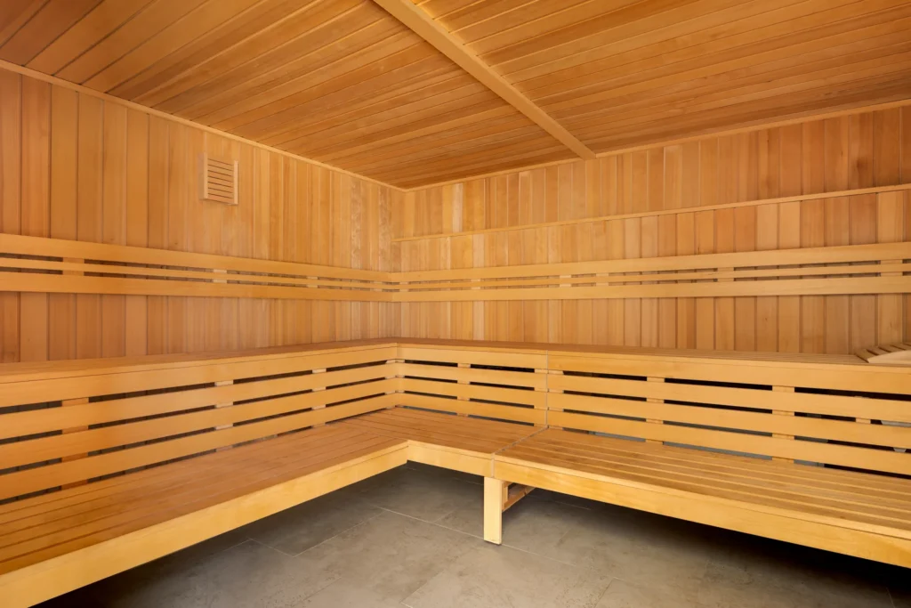 Wooden sauna interior at Secrets St. Lucia Resort & Spa, offering a relaxing wellness experience in a tranquil adults-only Caribbean setting.