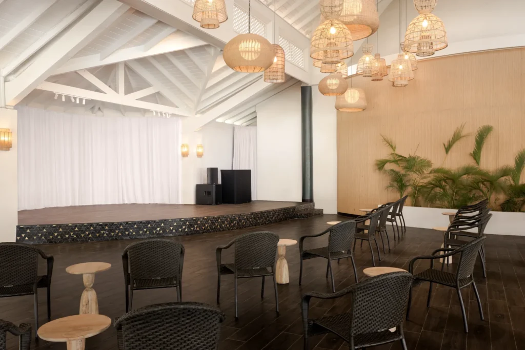 Showtime Theater Bar at Secrets St. Lucia Resort & Spa featuring a lively indoor theater setting with cocktails and nightly entertainment.