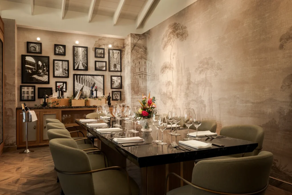Private wine cellar dining room with elegant table setting at Secrets St. Lucia Resort & Spa, perfect for intimate dinners and special occasions.