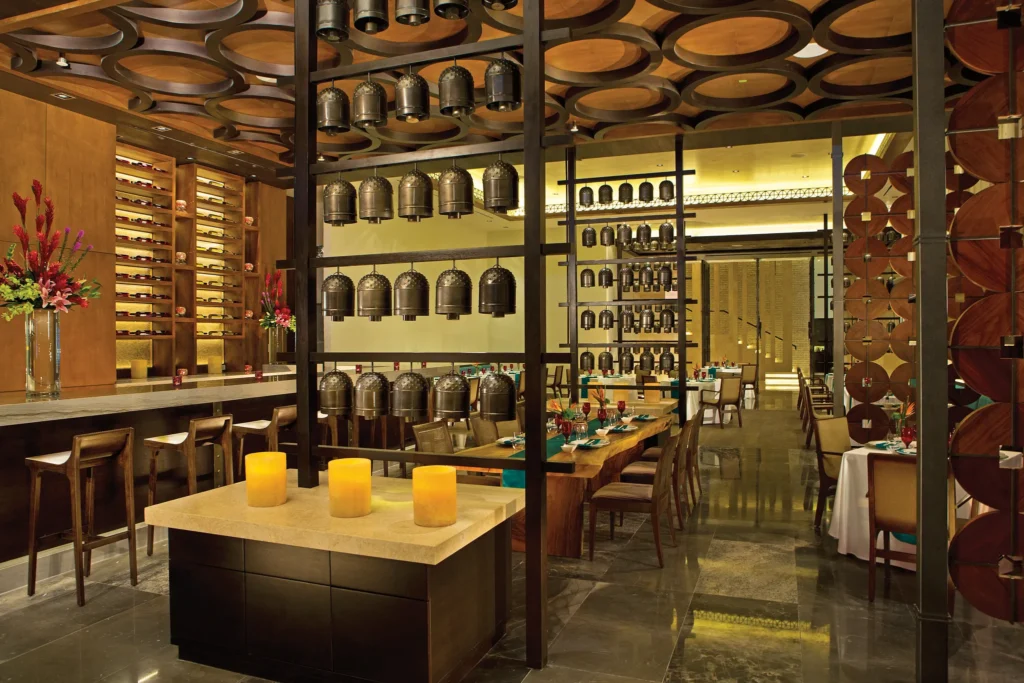 Dragons restaurant at Secrets The Vine Cancun featuring an elegant dining atmosphere with Asian-inspired décor and Far East cuisine specialties.