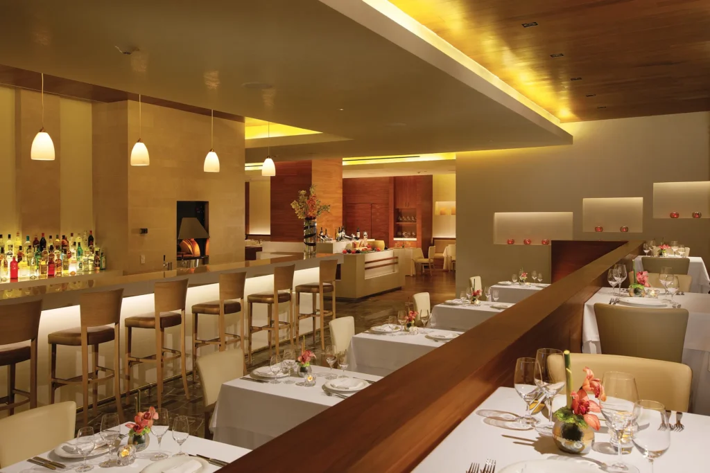 Nebbiolo Ristorante at Secrets The Vine Cancun featuring elegant indoor and outdoor dining with Italian specialties and stone-oven pizza.