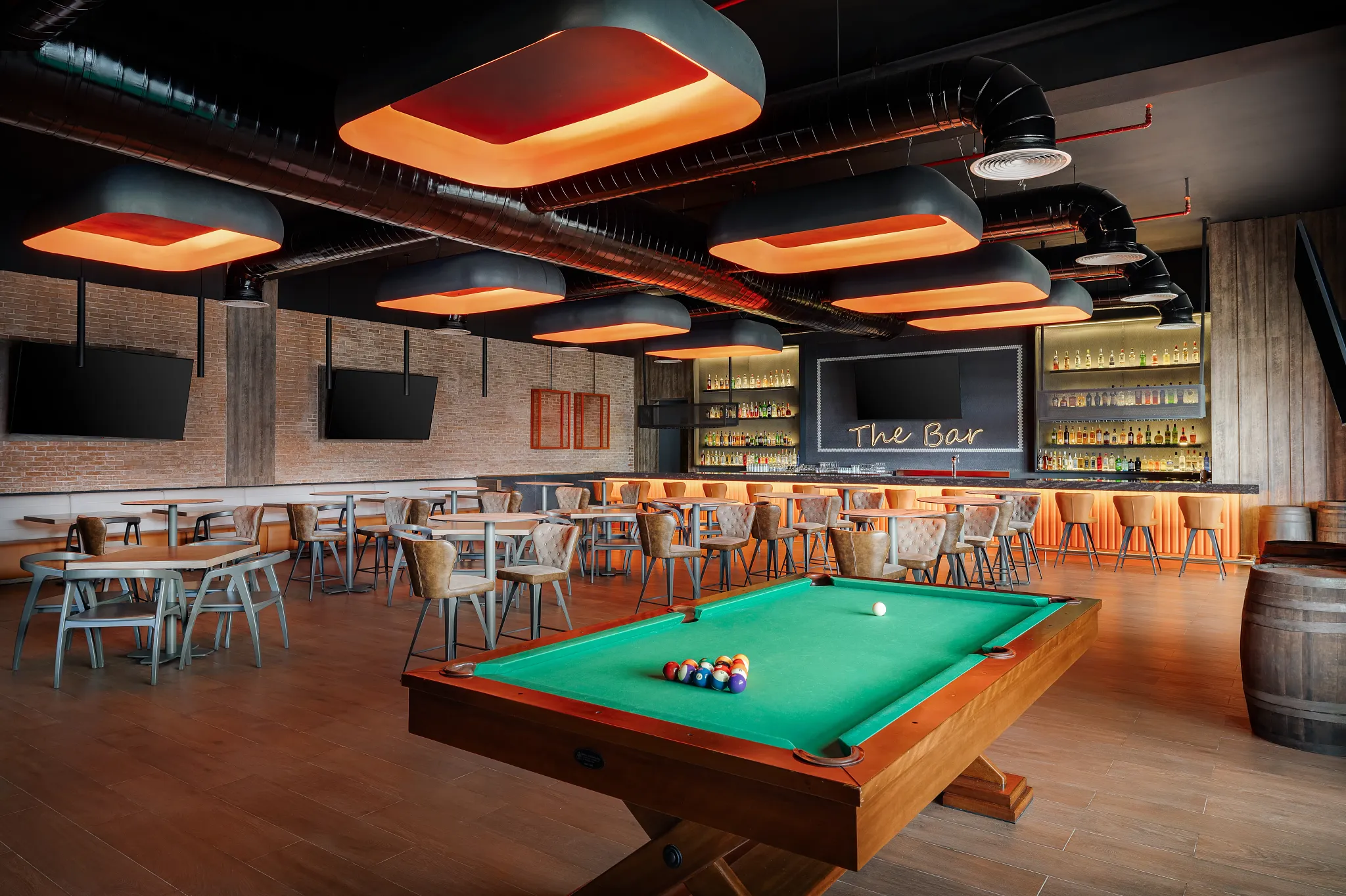 Desires sports bar at Secrets Tides Punta Cana with big screens, games, and casual bar food