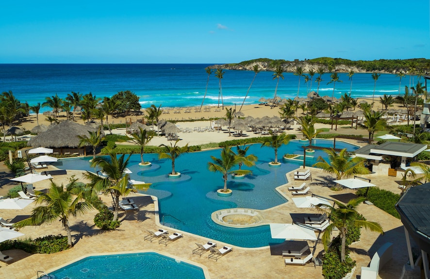 Dreams Macao Beach Punta Cana family-friendly all-inclusive resort with beachfront pools, lush grounds, and world-famous Macao Beach in the Dominican Republic.