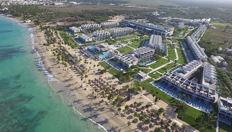 Excellence El Carmen adults-only all-inclusive resort in Punta Cana with beachfront pools, luxury suites, and tropical gardens.