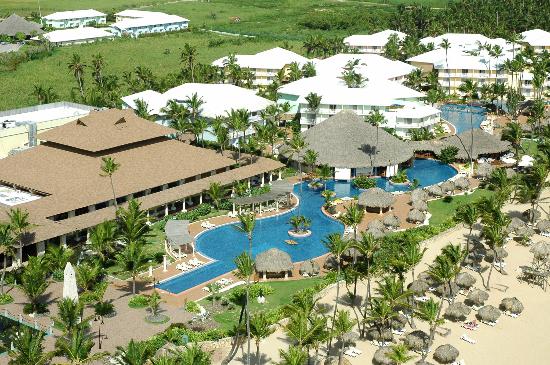 Excellence Punta Cana adults-only all-inclusive resort with tropical gardens, swim-up suites, and white sand beach in Dominican Republic.