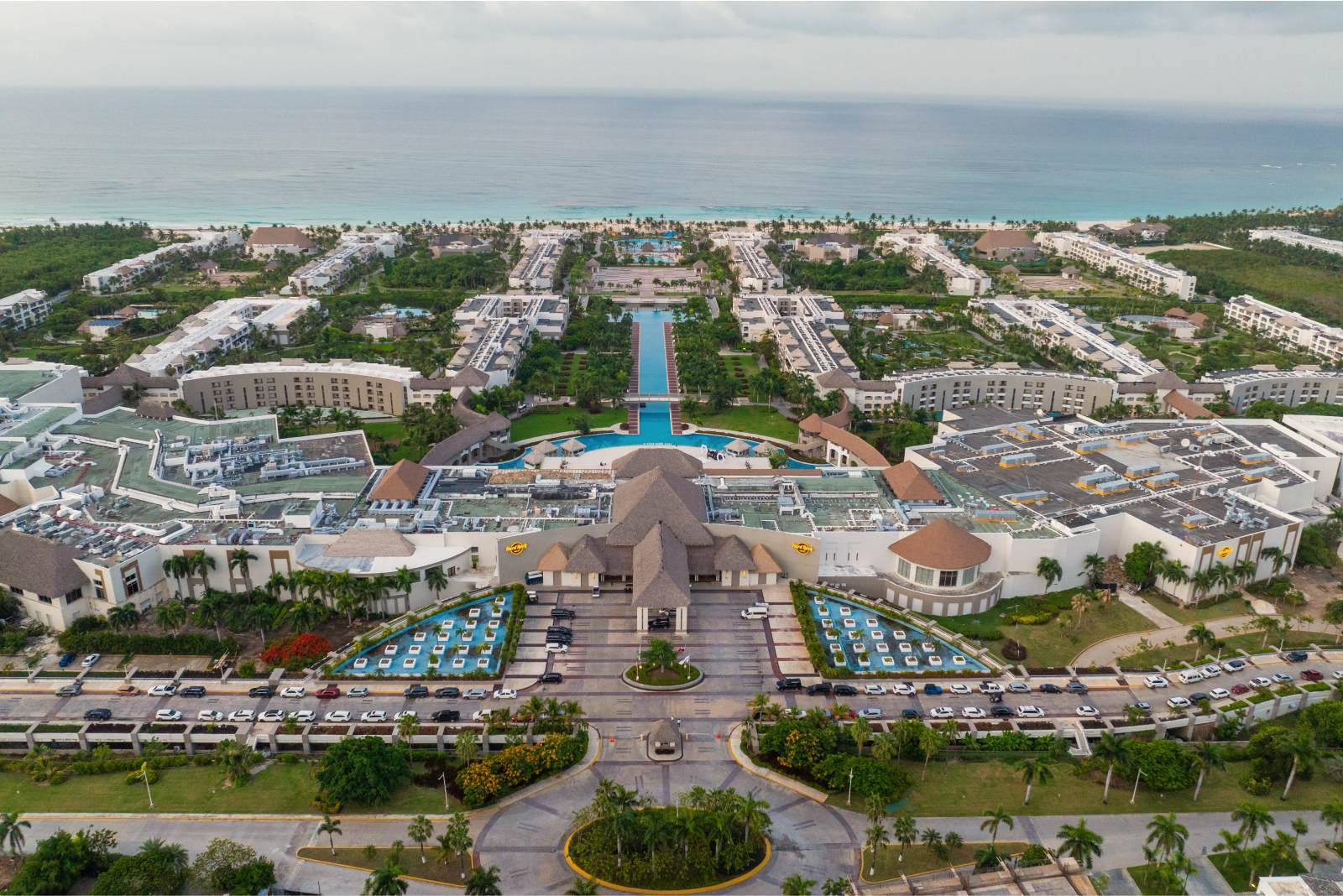 Hard Rock Hotel and Casino Punta Cana all-inclusive mega-resort with expansive pools, casino, golf course, and family entertainment.