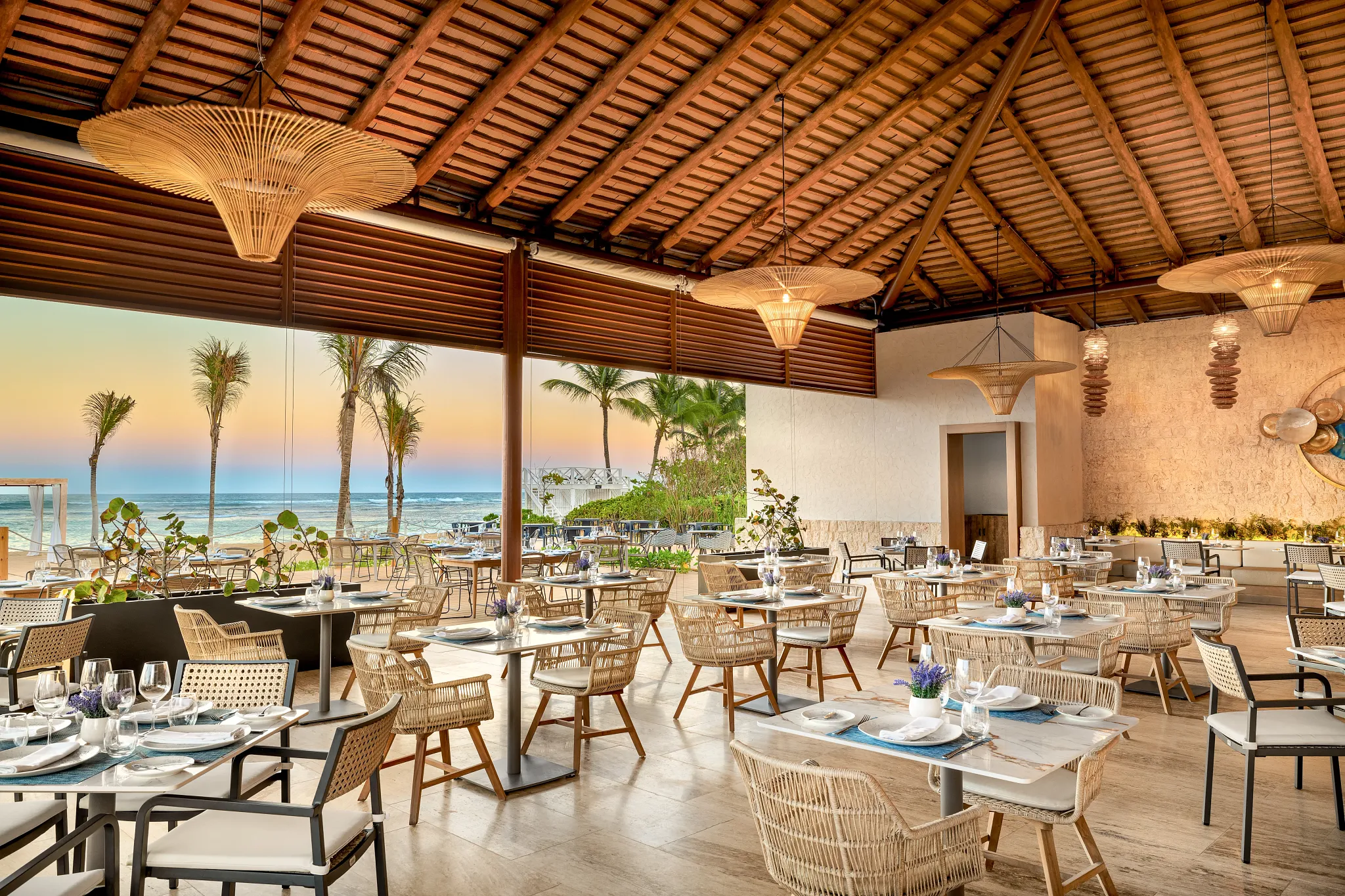 Oceana seafood restaurant at Secrets Tides Punta Cana featuring oceanfront dining, fresh seafood dishes, and a romantic seaside ambiance.