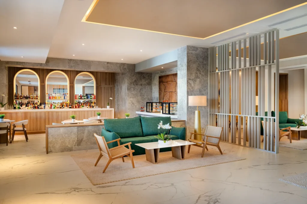 Preferred Club Lounge Bar at Secrets Tides Punta Cana featuring an upscale lounge setting with premium cocktails and light snacks.