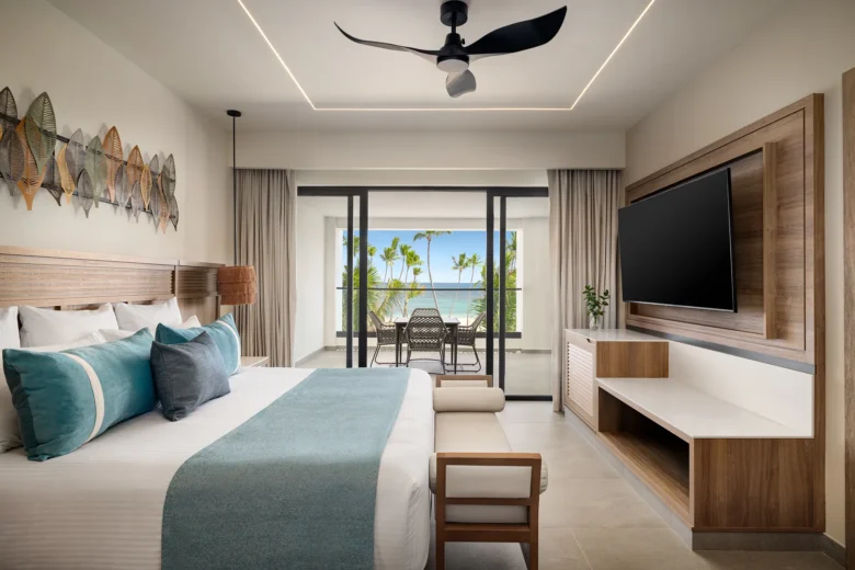 Preferred Club Master Suite Ocean Front bedroom with king bed and oceanfront terrace at Secrets Tides Punta Cana.