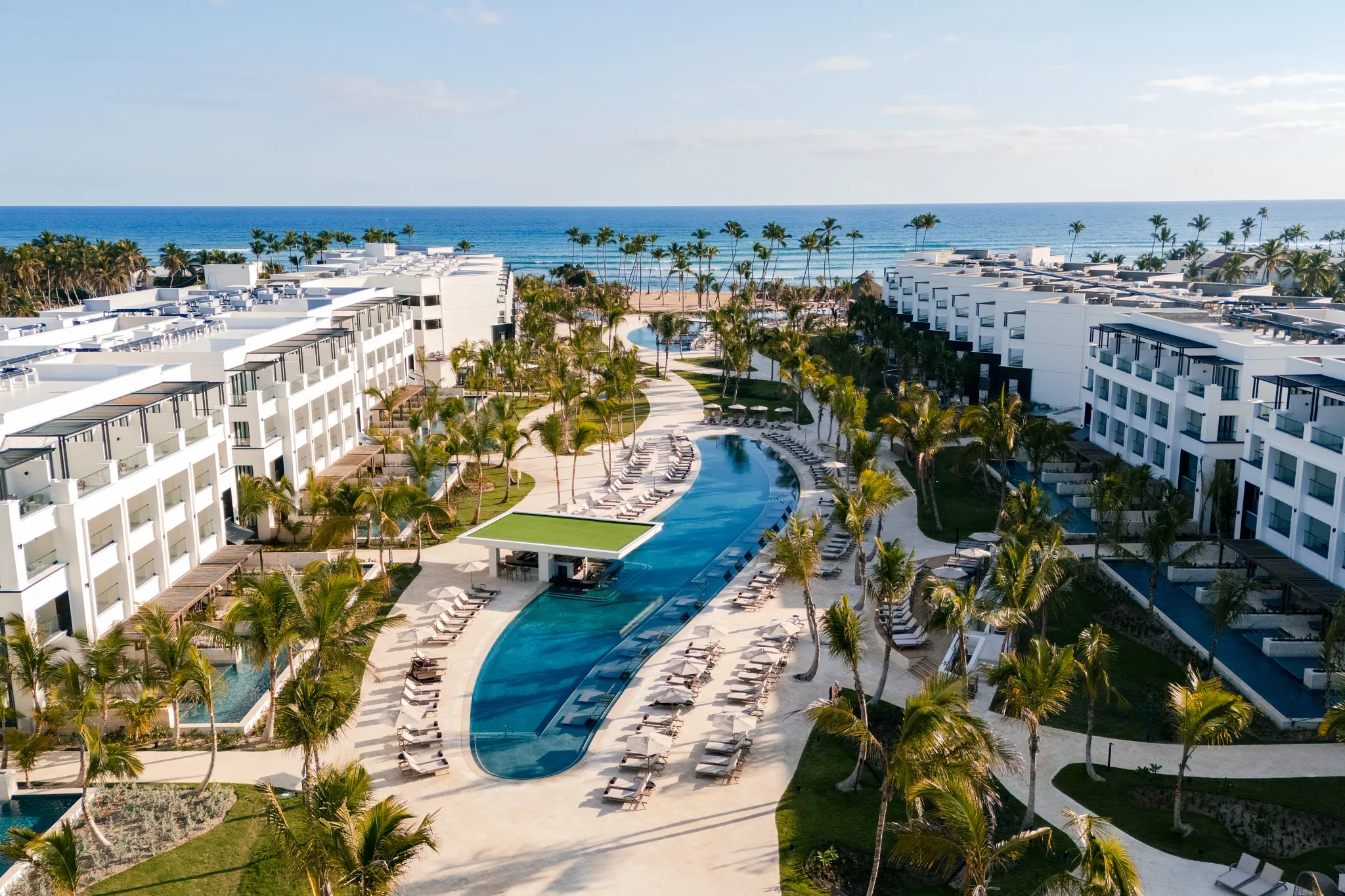 Secrets Tides Punta Cana adults-only all-inclusive resort with beachfront infinity pools, modern suites, and Caribbean ocean views.