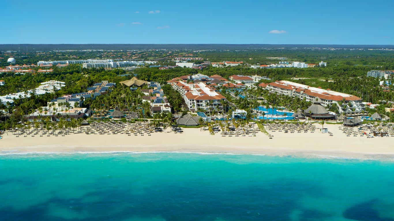 Secrets Royal Beach Punta Cana adults-only all-inclusive resort with tropical gardens, beachfront pools, and romantic atmosphere in the Dominican Republic.