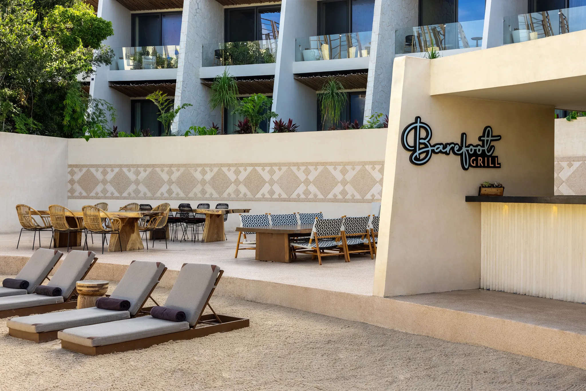 Barefoot Grill at Secrets Tulum Resort & Beach Club featuring casual outdoor dining, grilled favorites, and a relaxed poolside atmosphere.