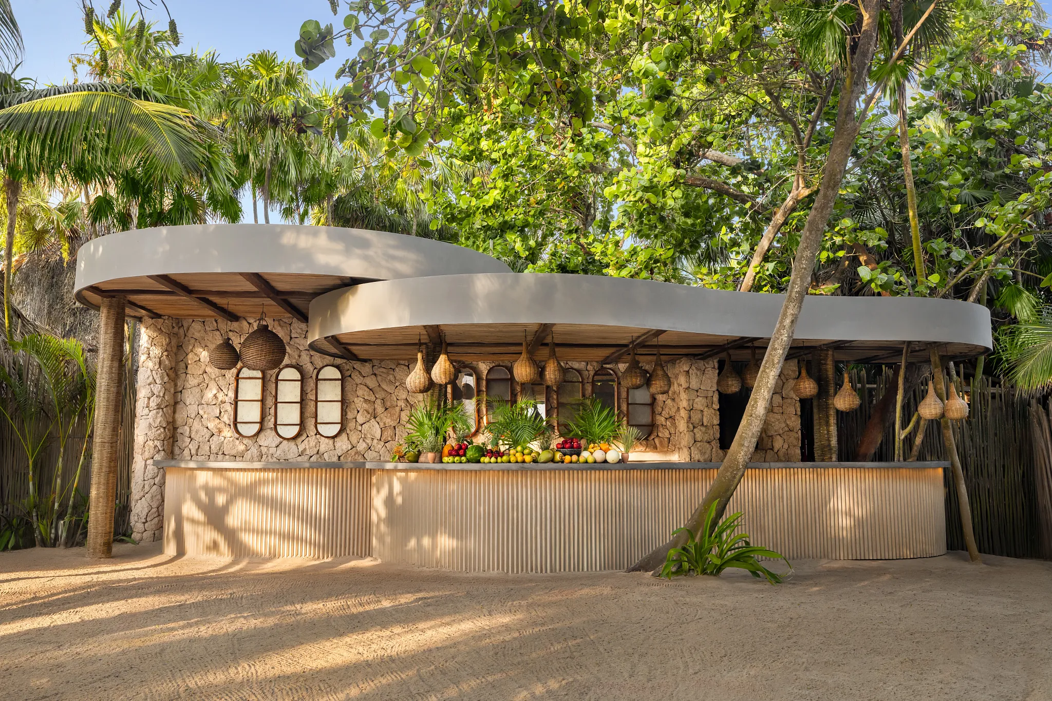 Barracuda Beach Bar at Secrets Tulum Resort & Beach Club featuring tropical cocktails, ocean views, and a relaxed beachfront atmosphere.