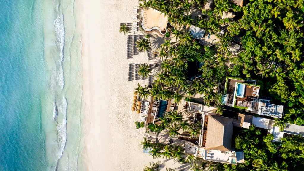 Aerial view of Casa Zamna Beach Club and the surrounding white-sand beach along the Caribbean Sea.