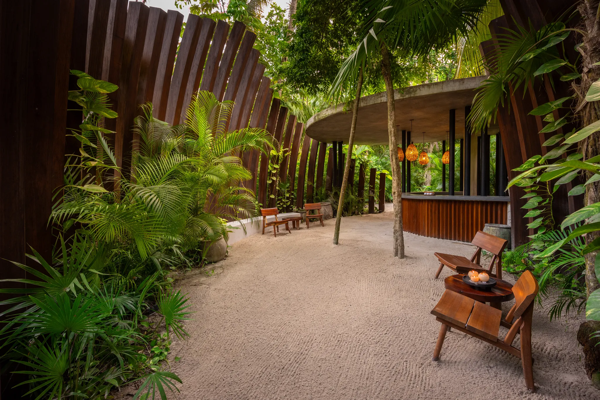 Open-air lobby surrounded by tropical gardens at Casa Zamna Beach Club at Secrets Tulum Resort & Beach Club.