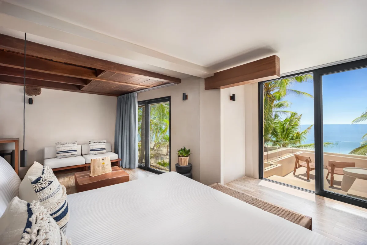 Casa Zamna Ocean Front bedroom with furnished ocean-view terrace at Secrets Tulum Resort & Beach Club.