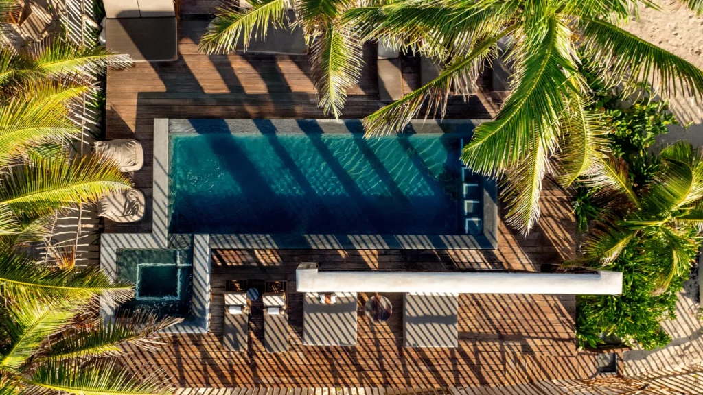 Overhead view of the beachfront pool at Casa Zamna Beach Club in Tulum.