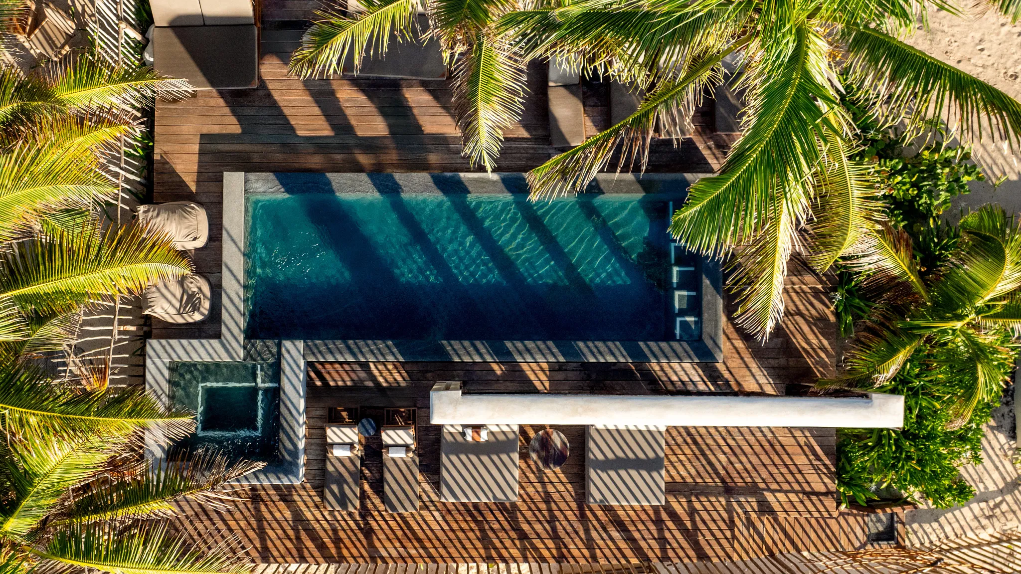 Overhead view of the beachfront pool at Casa Zamna Beach Club in Tulum.