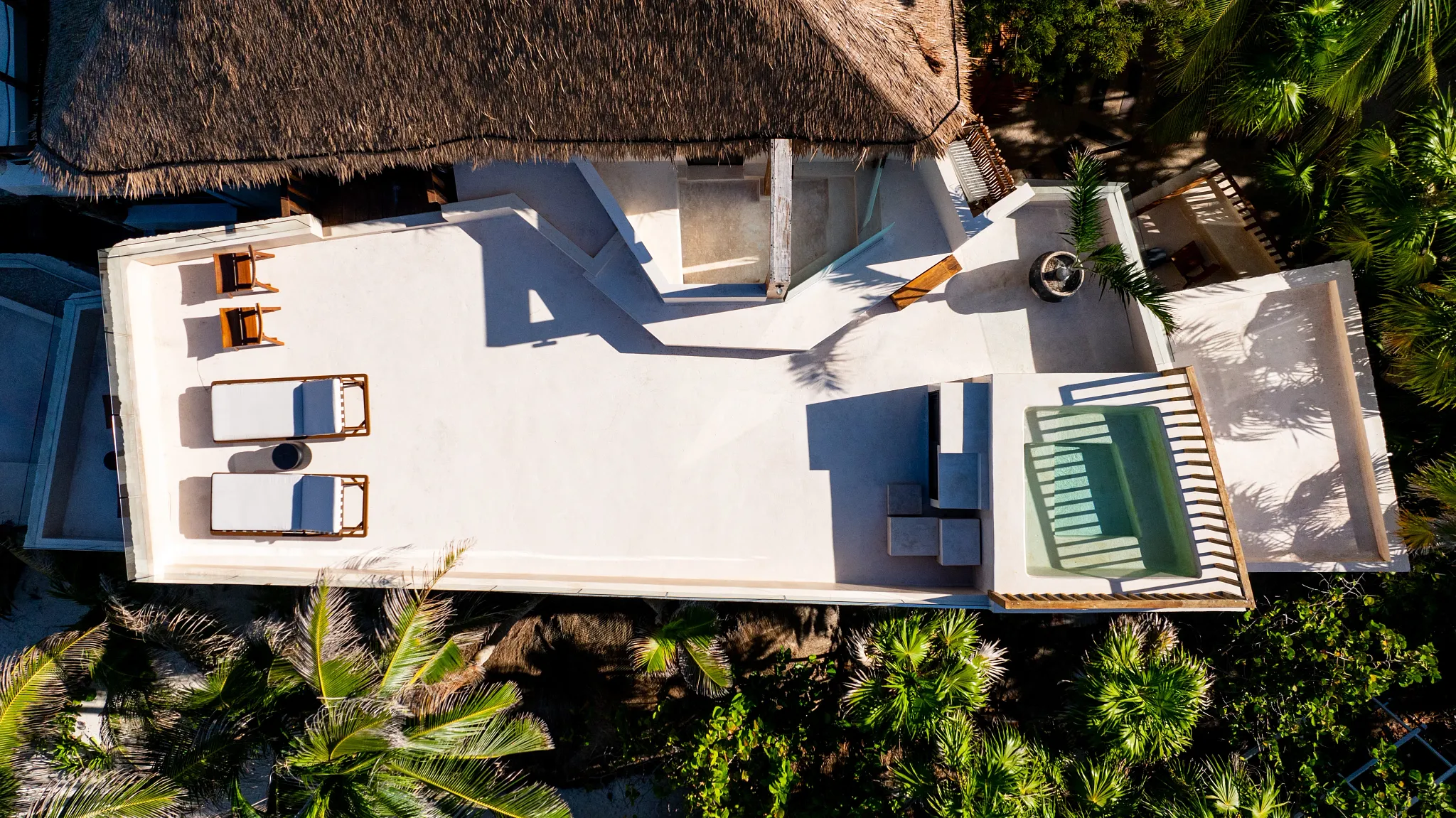 Overhead view of a rooftop terrace with plunge pool at Casa Zamna Beach Club.