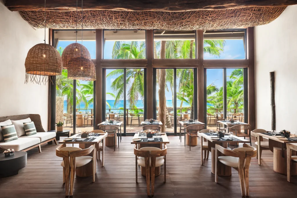Rosewater Restaurant at Secrets Tulum Resort & Beach Club featuring elegant indoor dining, contemporary décor, and gourmet international cuisine.