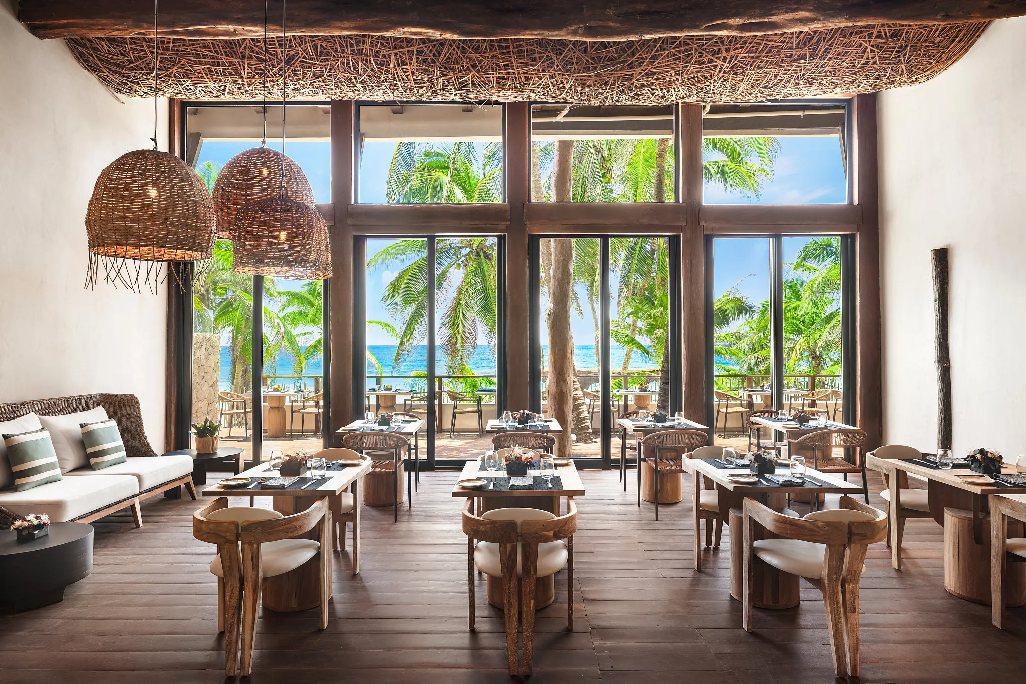Rosewater Restaurant at Secrets Tulum Resort & Beach Club featuring elegant indoor dining, contemporary décor, and gourmet international cuisine.