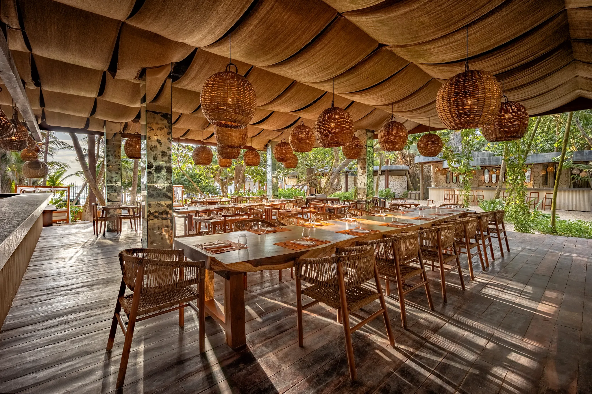 Seaside Grill at Secrets Tulum Resort & Beach Club featuring open-air beachfront dining, grilled specialties, and breathtaking Caribbean Sea views.