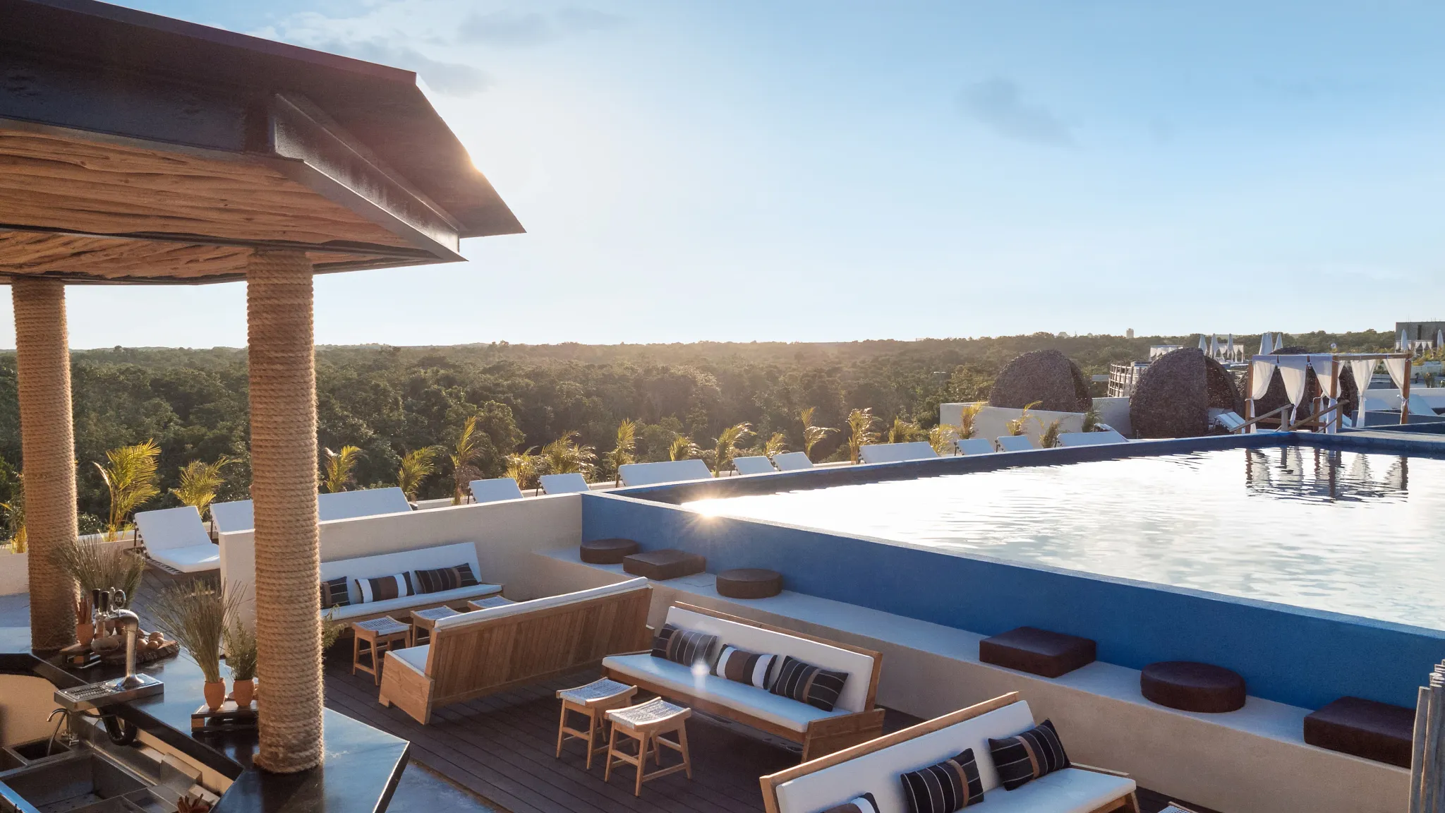 Sky Bar at Secrets Tulum Resort & Beach Club featuring handcrafted cocktails, panoramic rooftop views, and a sophisticated open-air lounge.