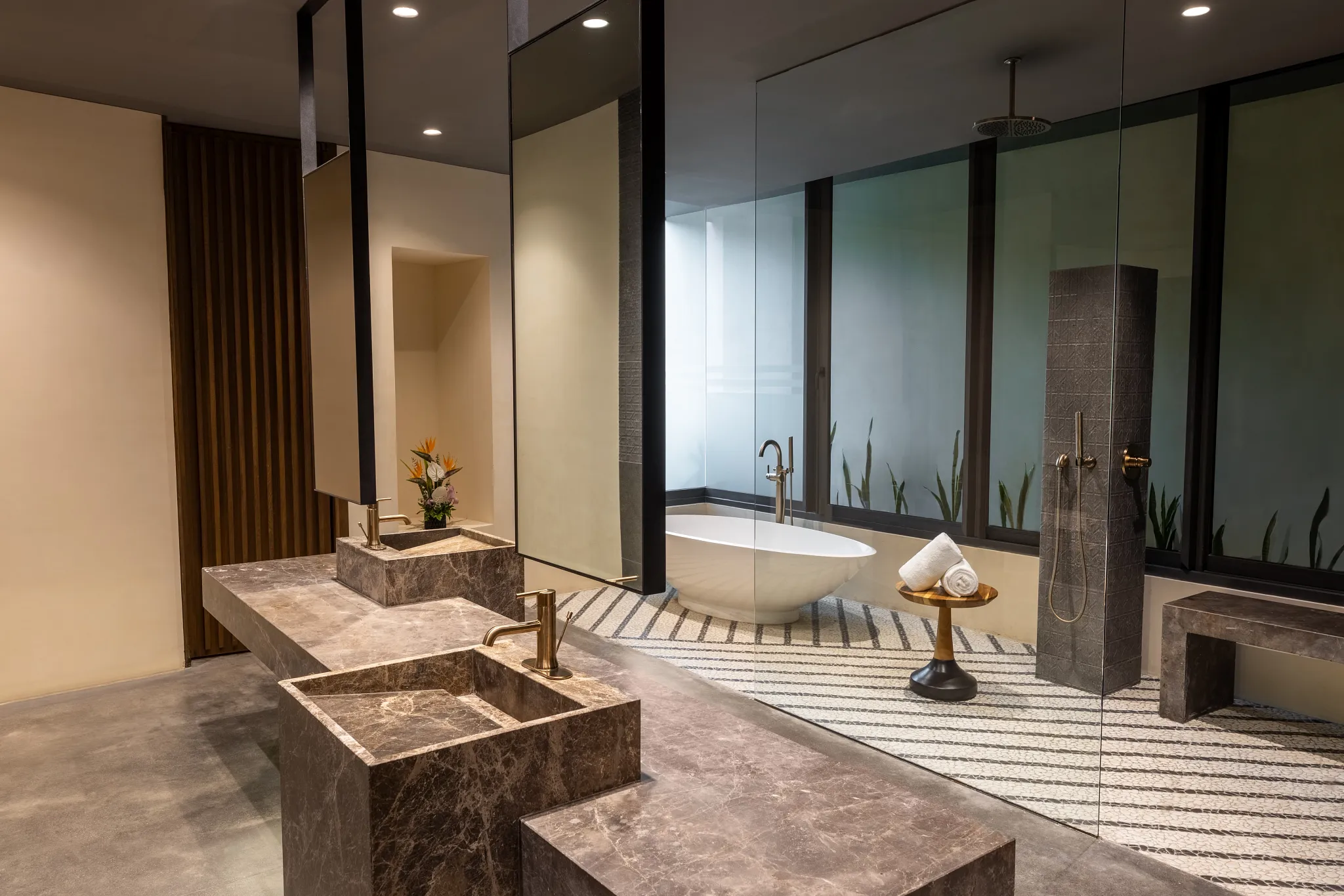 Luxurious spa bathroom with soaking tub and rainfall shower at Secrets Tulum Resort & Beach Club.