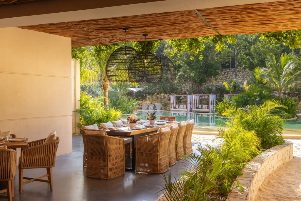 The Grotto Bar at Secrets Tulum Resort & Beach Club featuring a unique cave-inspired setting, handcrafted cocktails, and an intimate atmosphere.