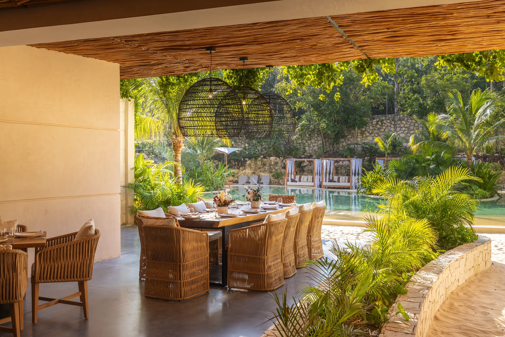 The Grotto Bar at Secrets Tulum Resort & Beach Club featuring a unique cave-inspired setting, handcrafted cocktails, and an intimate atmosphere.