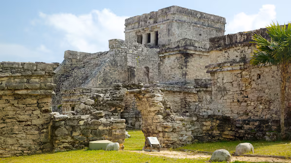 Tulum Mayan Ruins near Secrets Tulum Resort & Beach Club overlooking the Caribbean Sea with ancient archaeological structures