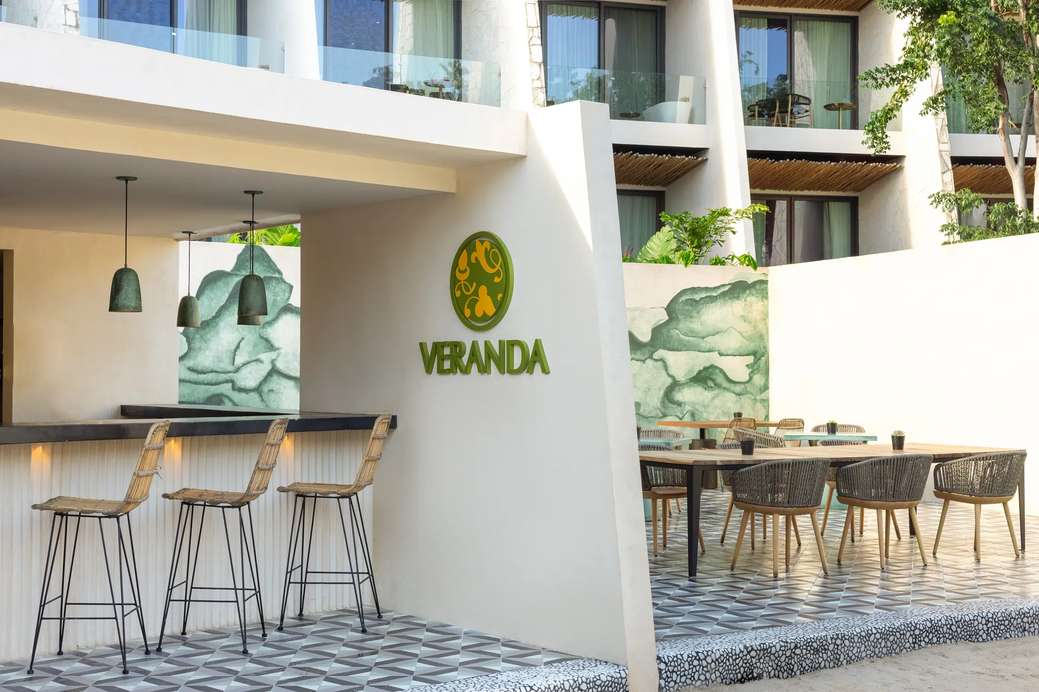 Veranda Lobby Bar at Secrets Tulum Resort & Beach Club featuring elegant lounge seating, handcrafted cocktails, and a sophisticated open-air ambiance.