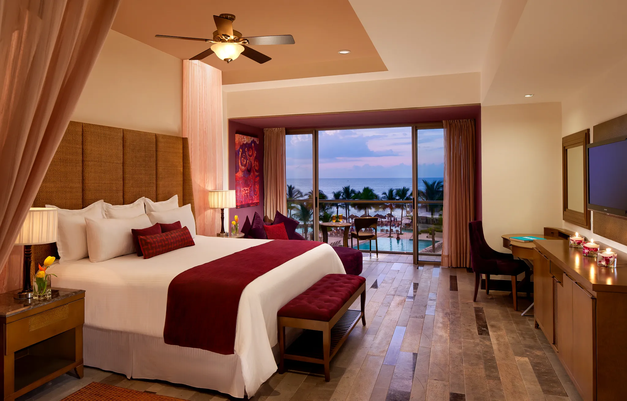 Junior Suite Garden View with king bed and private balcony overlooking tropical gardens at Secrets Vallarta Bay Puerto Vallarta.