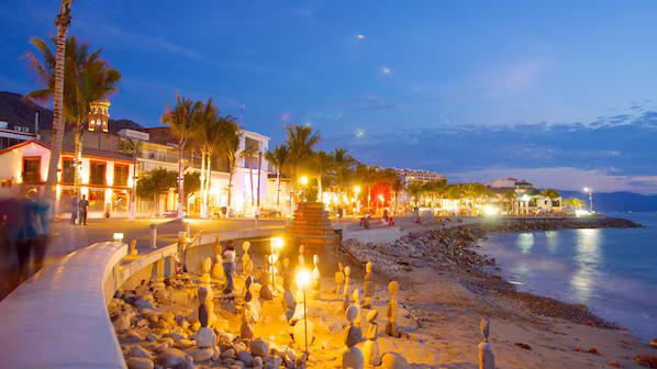 Malecón near Secrets Vallarta Bay Puerto Vallarta with lively boardwalk, ocean views, and local sculptures