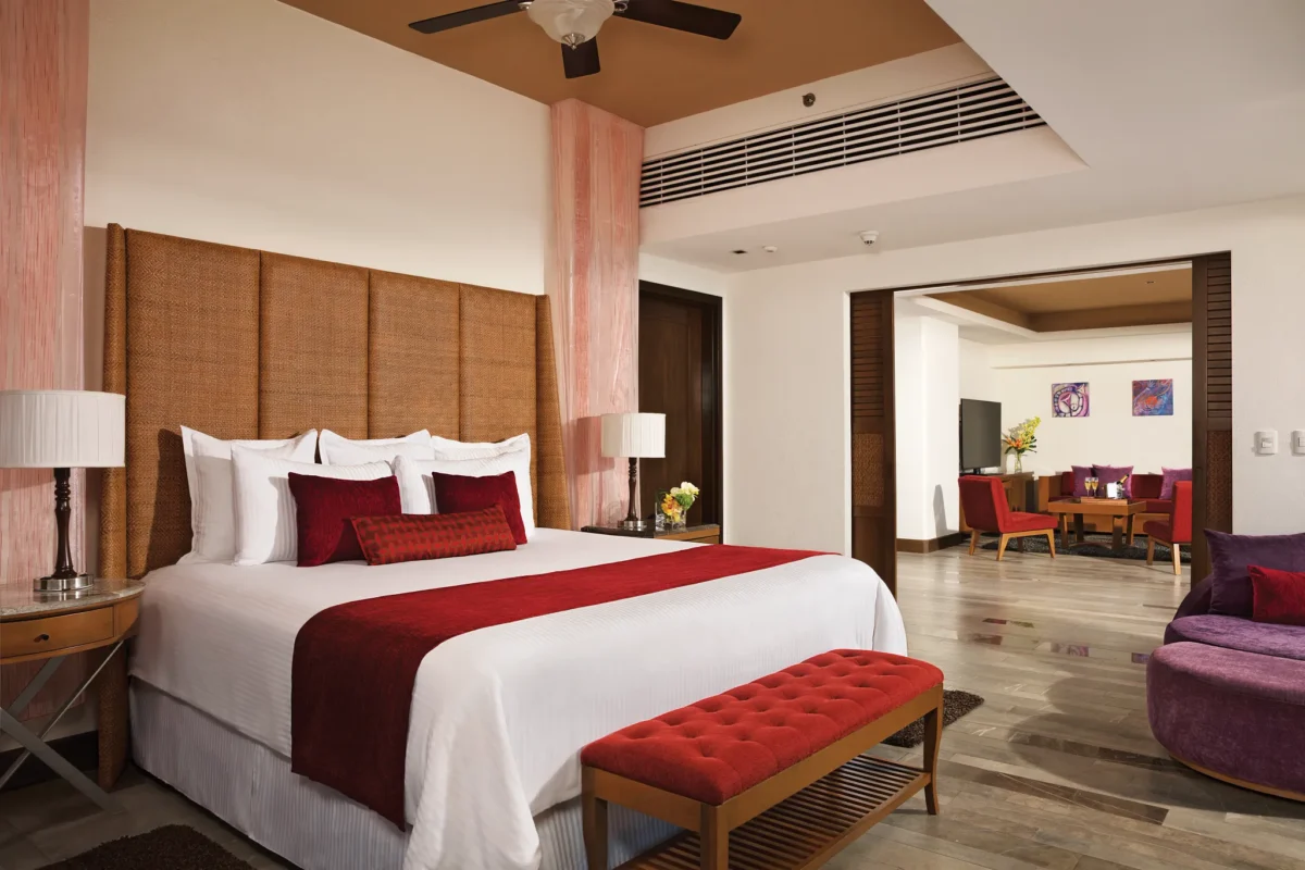 Preferred Club Master Suite Oceanfront bedroom with king bed and separate living area at Secrets Vallarta Bay Puerto Vallarta.