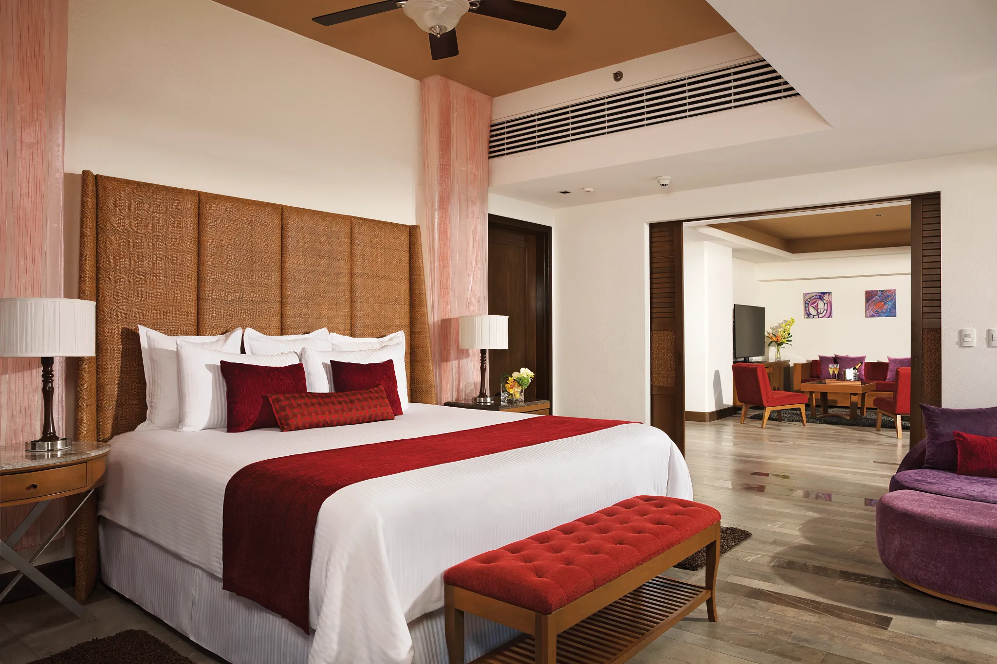 Preferred Club Master Suite Swim Out Garden View bedroom with king bed and separate living area at Secrets Vallarta Bay Puerto Vallarta.