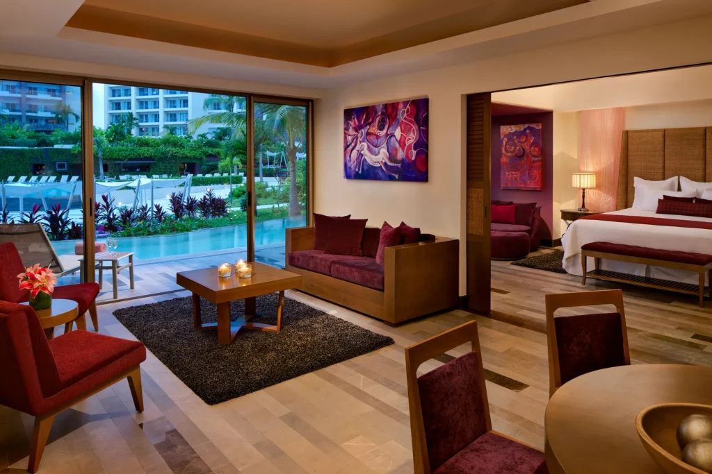 Preferred Club Master Suite Swim Out Garden View living room with private terrace and direct pool access at Secrets Vallarta Bay Puerto Vallarta.