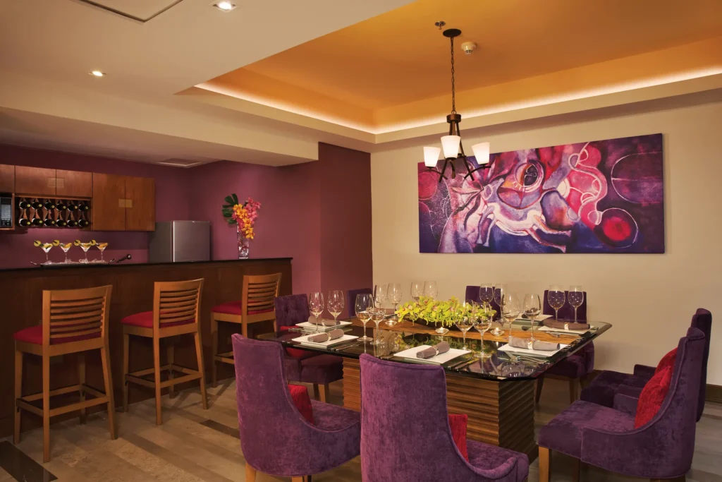 Presidential Suite dining room with private bar and seating area at Secrets Vallarta Bay Puerto Vallarta.